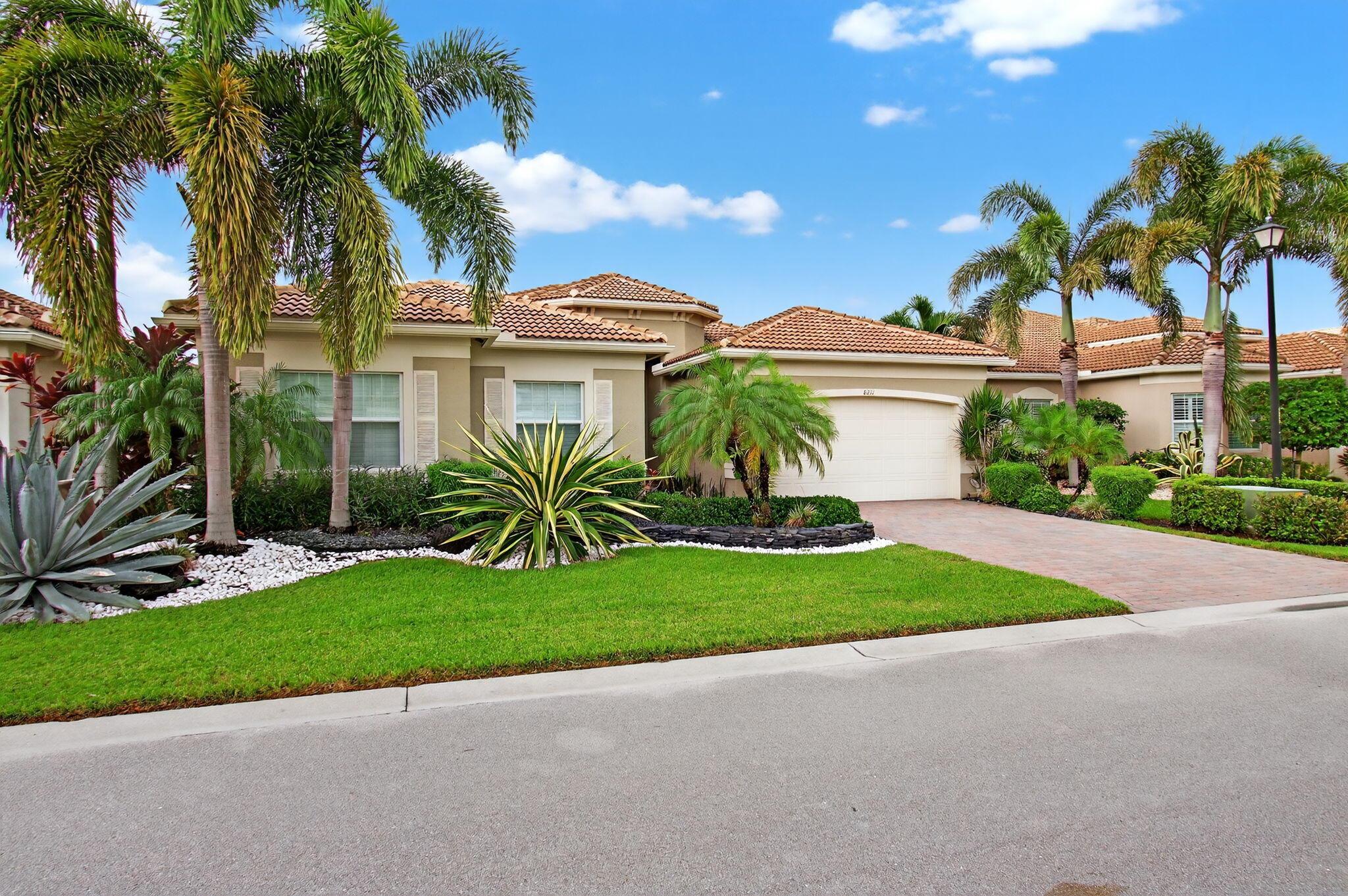 Elegant 3 bedroom plus den/3bathroom Lydia model Pool home ready for your enjoyment! Wonderful OPEN FLOOR PLAN with wall removed welcomes you past a custom mirror wall treatment by the frosted glass front double doors and gorgeous beaded chandelier. Serene backyard with end of lake and peaceful garden view with panoramic screened-in heated saline pool await you in this beautiful home...Living room has double tray ceiling with double crown moldings. Tasteful tan marble-like porcelain tile throughout, Formal Dining Room, Volume Ceilings, Crown Molding, Impact Glass and Garage Door, and elegant fixtures and fans in whole house. ACs replaced in 2025. Kitchen features transom window over stovetop, double height cabinetry for plenty of storage, walk-in pantry,
