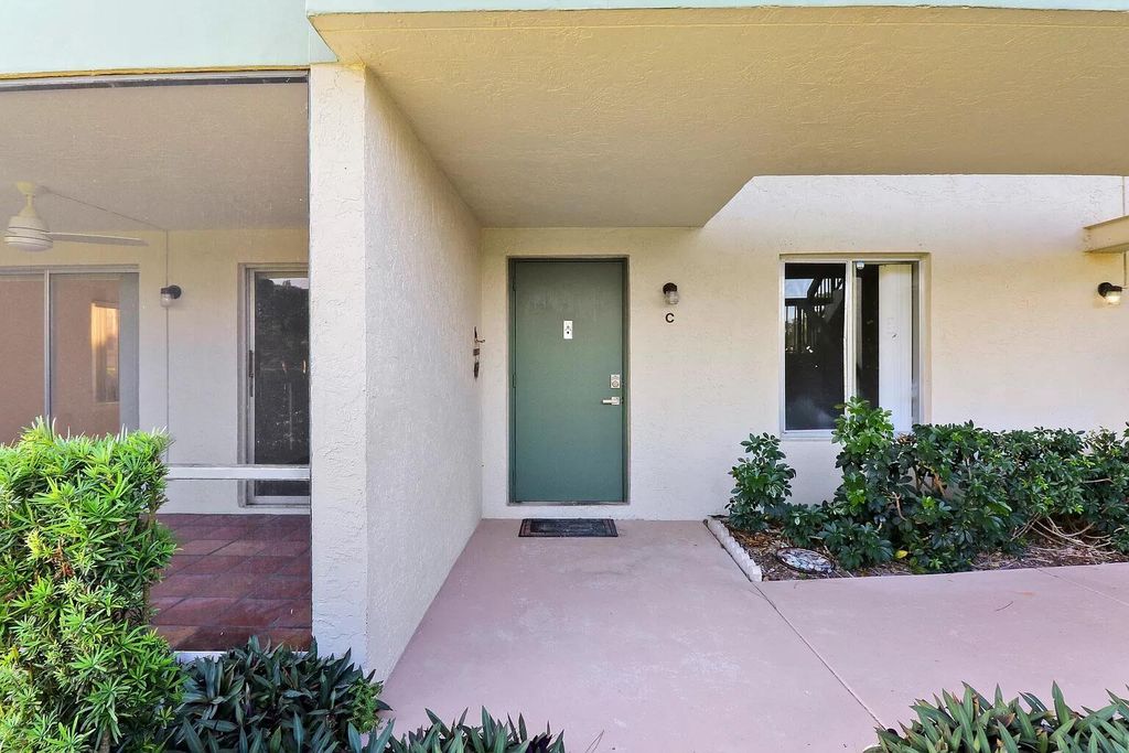 Photo of 6341 Chasewood Drive #Unit C, Jupiter, FL 33458 (MLS # B26013751)