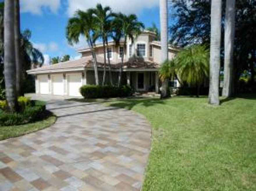 Spacious pool home sitting on over a third of an acre with lake and golf course views. Cypress Creek West features a low HOA of 120/month that includes 24/7 manned gates. Updated kitchen includes S/S double oven, natural gas cooktop, granite counters and oversized island all overlooking the golf course and pool. Family room is adjacent to the kitchen with fireplace making it ideal for entertaining. One bedroom down with full bath. Large master suite includes a balcony overlooking the golf course and spacious master bath with separate tub and shower. Two additional bedrooms complete the second floor along with full bath. Outside a large deck area leads to the pool with water feature as well as a spa all with expansive views of the golf course. This is one of the few homes with natural gas!