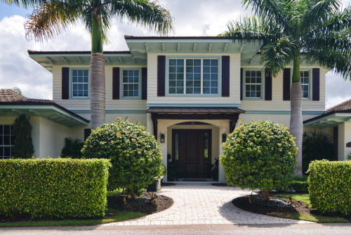 Clean lines, sharp accents and comfortable living are featured in this gorgeous  4 BR, 4 Bath home on the Loxahatchee River.   Stylish British West Indies elevation with large private dock and 2 boat lifts. Easy access to river and Jupiter Inlet.  Elegant outdoor relax and entertain area with pool, summer kitchen, Alfresco grill, bar and fruit trees.  Large garage with room for 4 cars.Wide plank dark oak floors and classy millwork flow throughout the stunning interior uniting the living room, formal dining room, family room and kitchen.  Gourmet kitchen is complemented with Wolf double oven and 6 burner gas stove, double Sub-Zero fridge freezer, 2 Bosch dishwashers, Caesar stone counters with 2 wine coolers and 2 sinks. Kitchen opens to breakfast area and family room for ease of living.