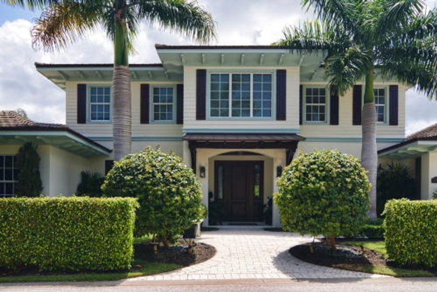 Clean lines, sharp accents and comfortable living are featured in this gorgeous  4 BR, 4 Bath home on the Loxahatchee River.   Stylish British West Indies elevation with large private dock and 2 boat lifts. Easy access to river and Jupiter Inlet.  Elegant outdoor relax and entertain area with pool, summer kitchen, Alfresco grill, bar and fruit trees.  Large garage with room for 4 cars.Wide plank dark oak floors and classy millwork flow throughout the stunning interior uniting the living room, formal dining room, family room and kitchen.  Gourmet kitchen is complemented with Wolf double oven and 6 burner gas stove, double Sub-Zero fridge freezer, 2 Bosch dishwashers, Caesar stone counters with 2 wine coolers and 2 sinks. Kitchen opens to breakfast area and family room for ease of living.