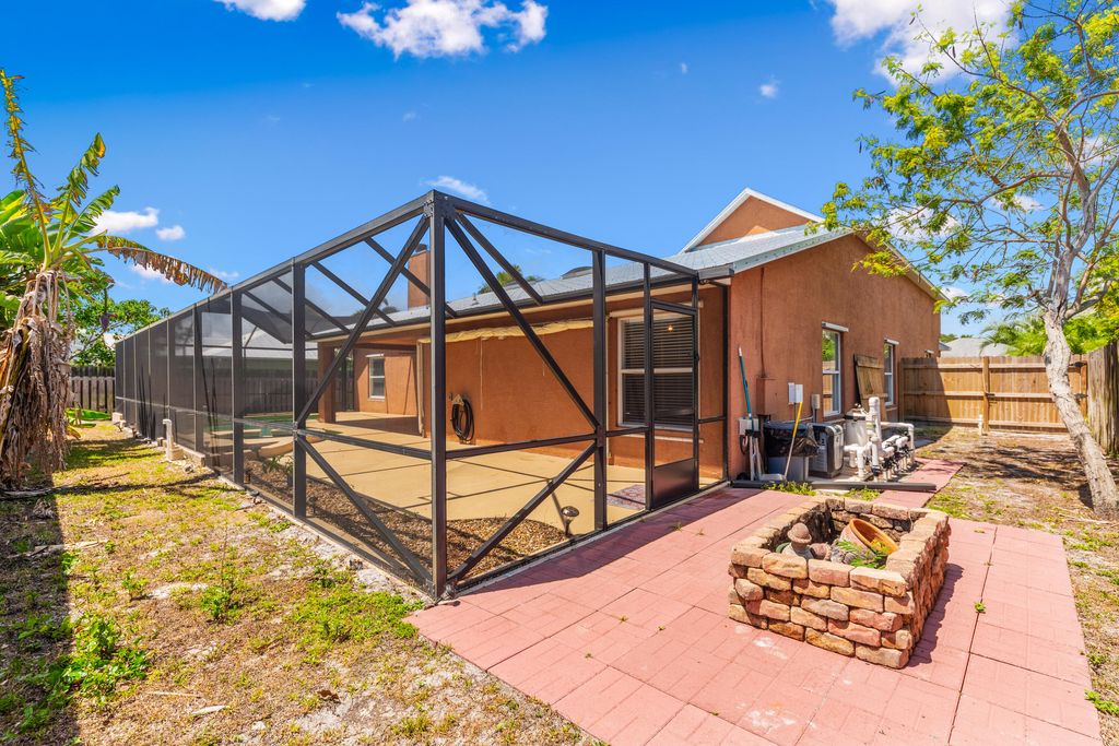 Photo of 1961 NE Steven Avenue, Jensen Beach, FL 34957 (MLS # R11003492)