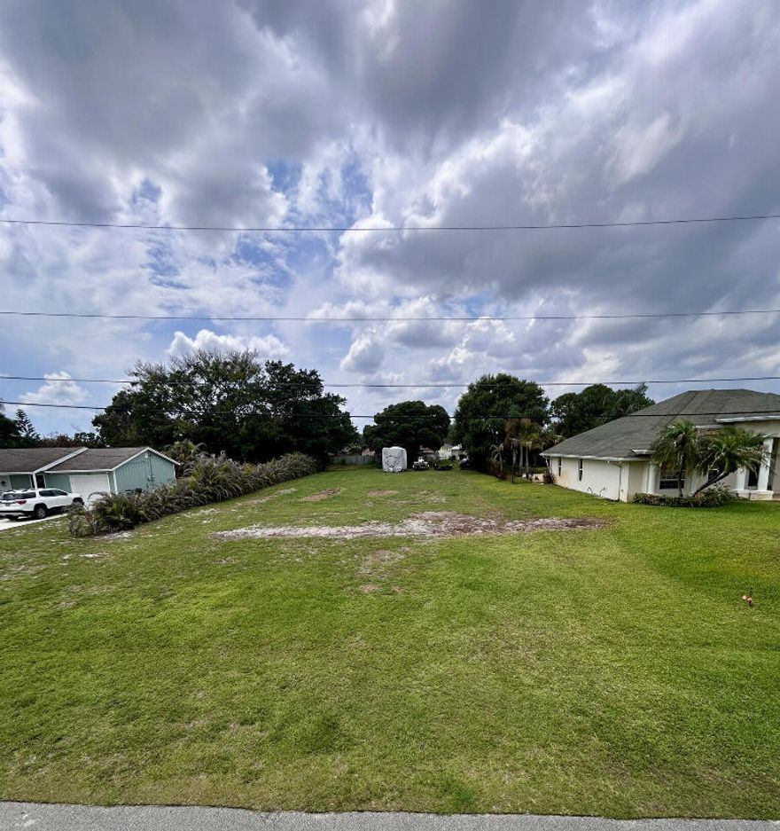 .36acres, Cleared Oversized Lot  Prime Oversized Vacant Lot - Ready to Build in Port St. Lucie  Build your dream home on this exceptional 15,757 sq ft cleared lot located at 145 SW Elderberry Drive in the highly desirable 34953 area of Port St. Lucie, Florida.  This oversized parcel offers significantly more space than most nearby lots and backs to a peaceful canal, providing an additional 65+ feet of easement buffer for enhanced privacy and relaxing water views. A recent official survey is included, confirming boundaries and buildable area.  Located on a street lined with newer, well-maintained homes, this property is surrounded by a clean, growing, family-friendly neighborhood.  No HOA — no fees, no approvals, no restrictive rules. Bring your vision and build without unnecessary limitati