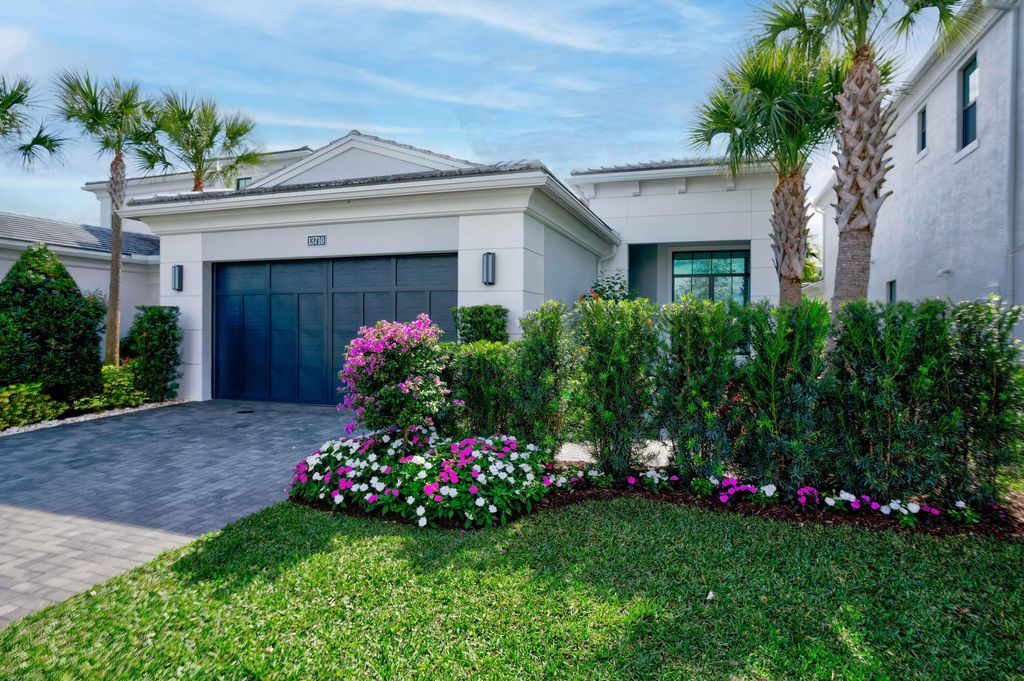 Photo of 13710 Artisan Circle, Palm Beach Gardens, FL 33418 (MLS # B26050560)