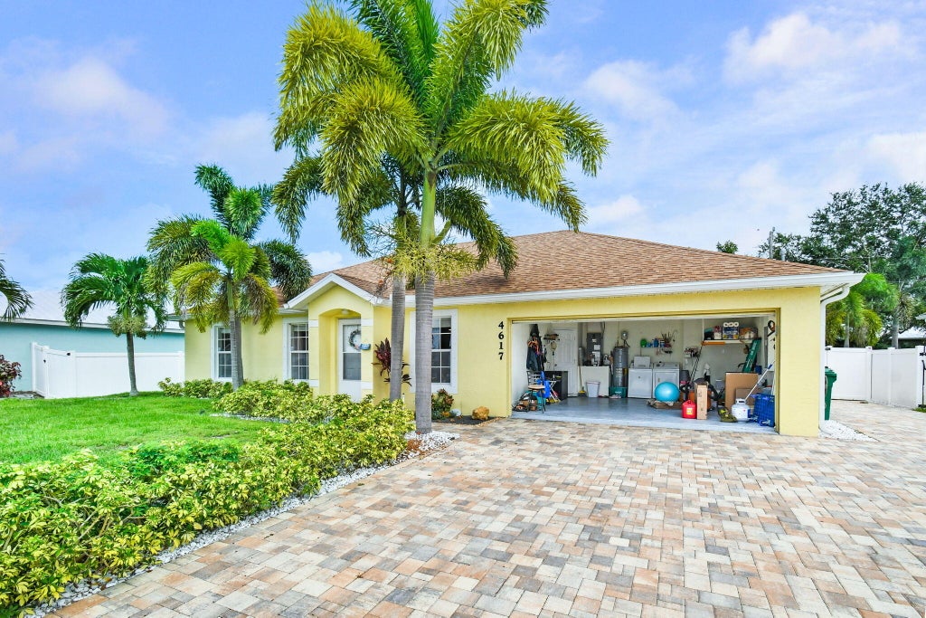 Photo of 4617 SW Pearl Street, Port Saint Lucie, FL 34953 (MLS # R11012507)