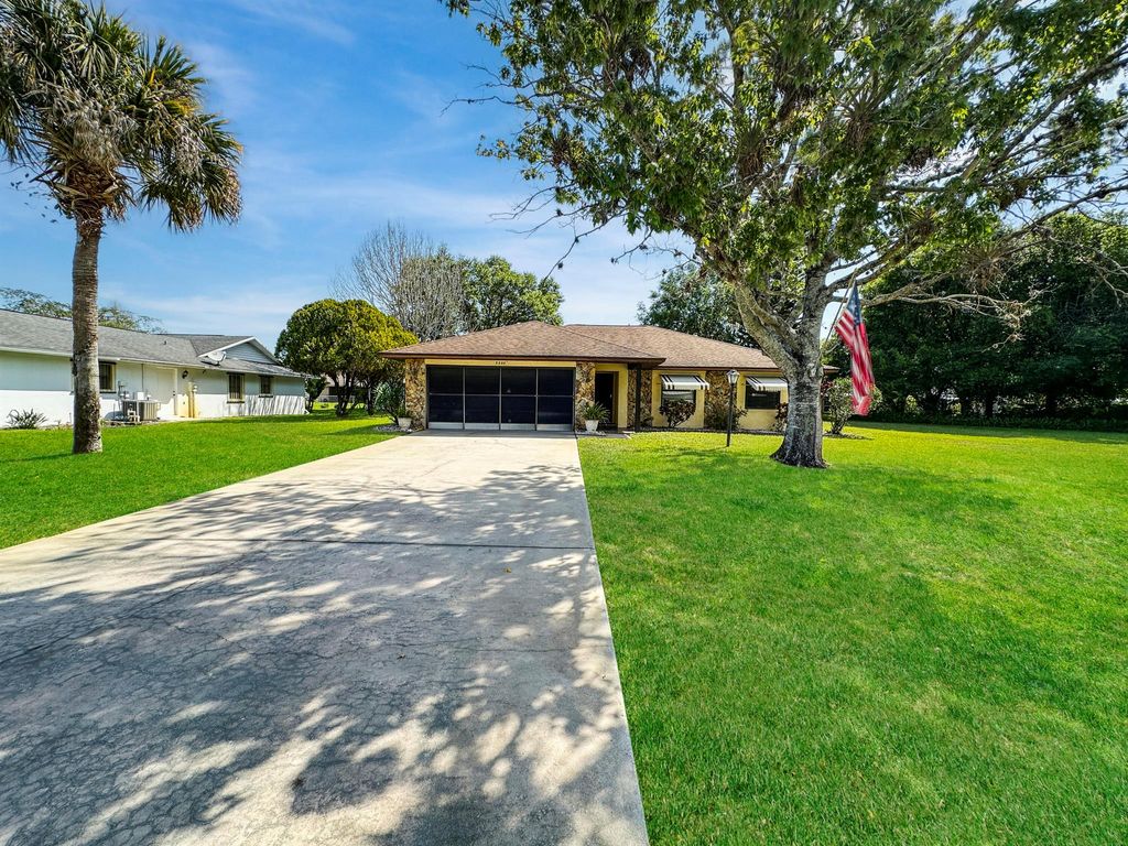 Photo of 5300 Paleo Pines Circle, Fort Pierce, FL 34951 (MLS # R10971163)