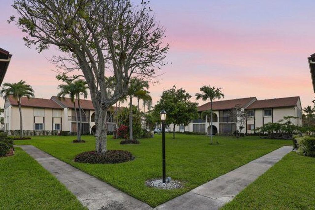 Photo of 3561 Tall Pine Way #C2, Greenacres, FL 33463 (MLS # B26040026)