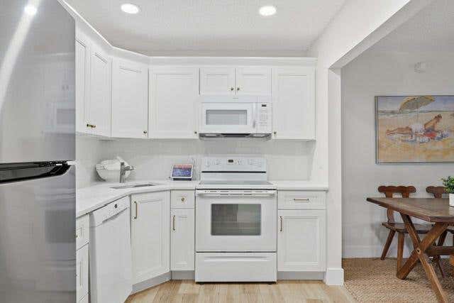Photo of 3561 Tall Pine Way #C2, Greenacres, FL 33463 (MLS # B26040026)