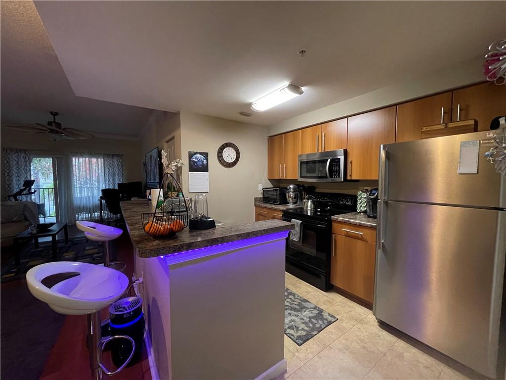 EL-AD POINCIANA CONDO - Residential