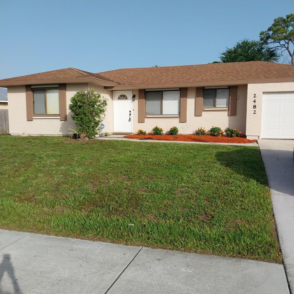 Photo of 2482 SE Floresta Drive, Port Saint Lucie, FL 34984 (MLS # R11136362)
