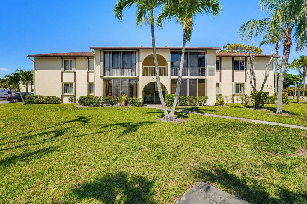 Photo of 5760 Pine Wood Drive #D-1, Greenacres, FL 33463 (MLS # B26020347)