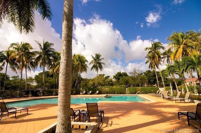 Photo of 741 LYONS Road #17203, Coconut Creek, FL 33063 (MLS # B26061416)
