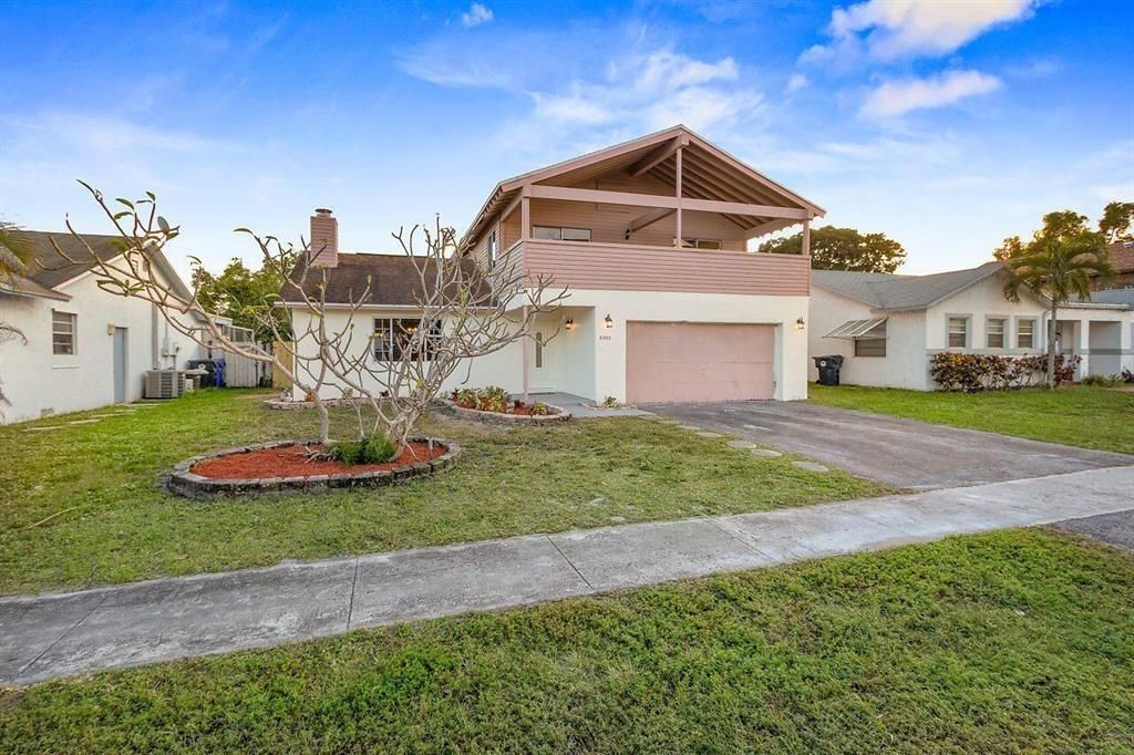 Photo of 8300 SW 20th Street, North Lauderdale, FL 33068 (MLS # R10853865)