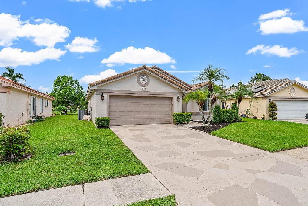 Photo of 8582 Tourmaline Boulevard, Boynton Beach, FL 33472 (MLS # R11124613)