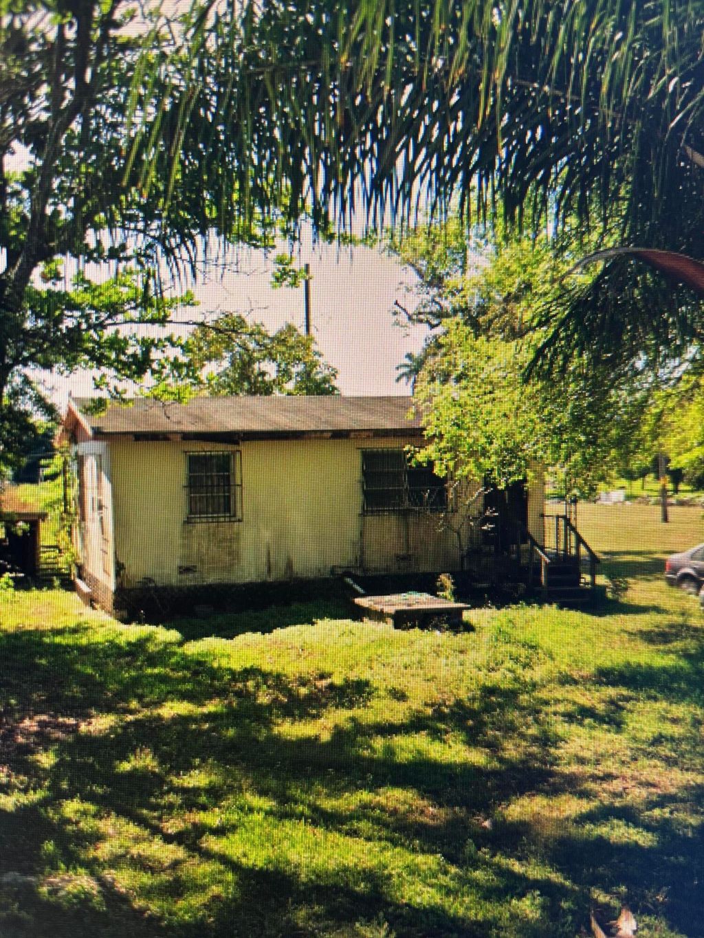 Photo of 1624 NW Avenue L, Belle Glade, FL 33430 (MLS # R11161720)