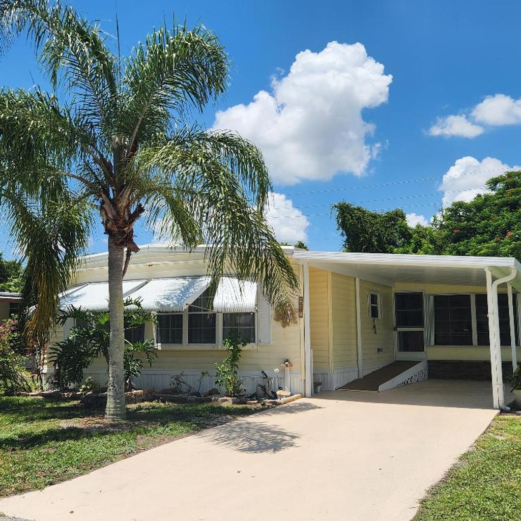 Photo of 218 W Caribbean, Port Saint Lucie, FL 34952 (MLS # R11111711)