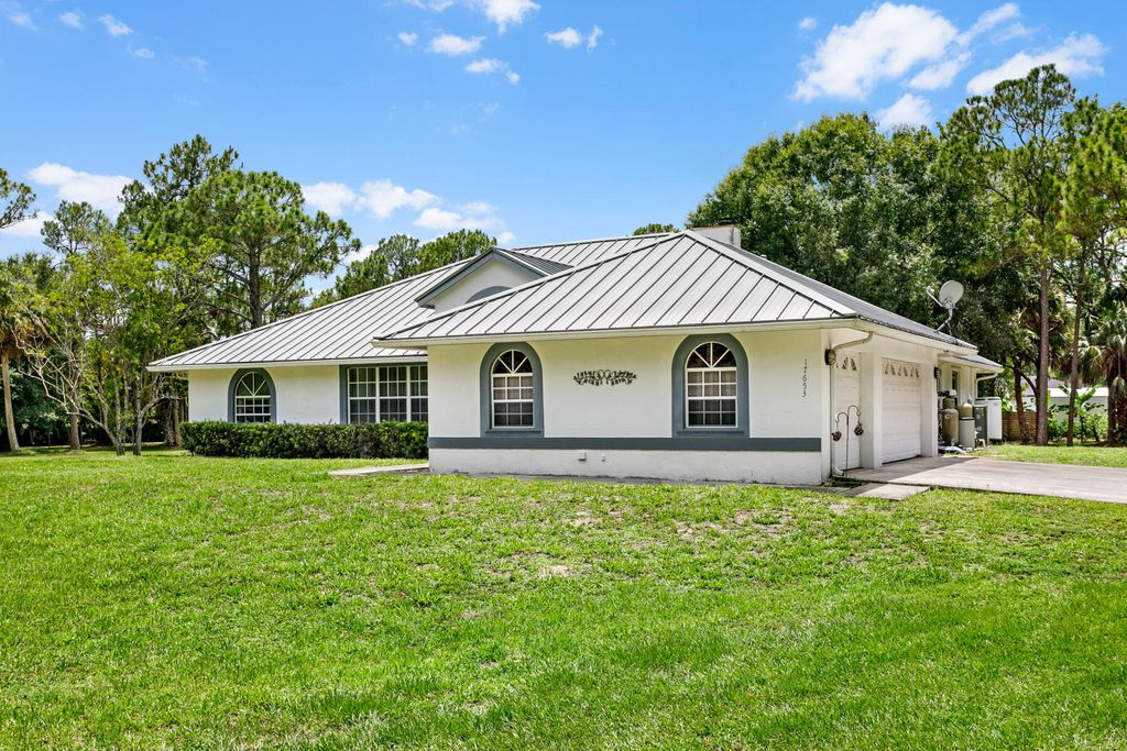 Photo of 17653 Winterhawk Trail, Jupiter, FL 33478 (MLS # R10999448)