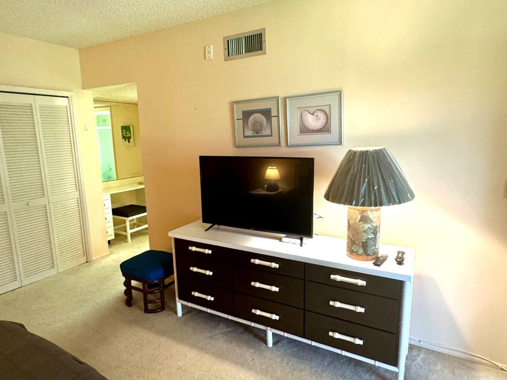 Photo of 3900 Oaks Clubhouse Drive #108, Pompano Beach, FL 33069 (MLS # F10476460)