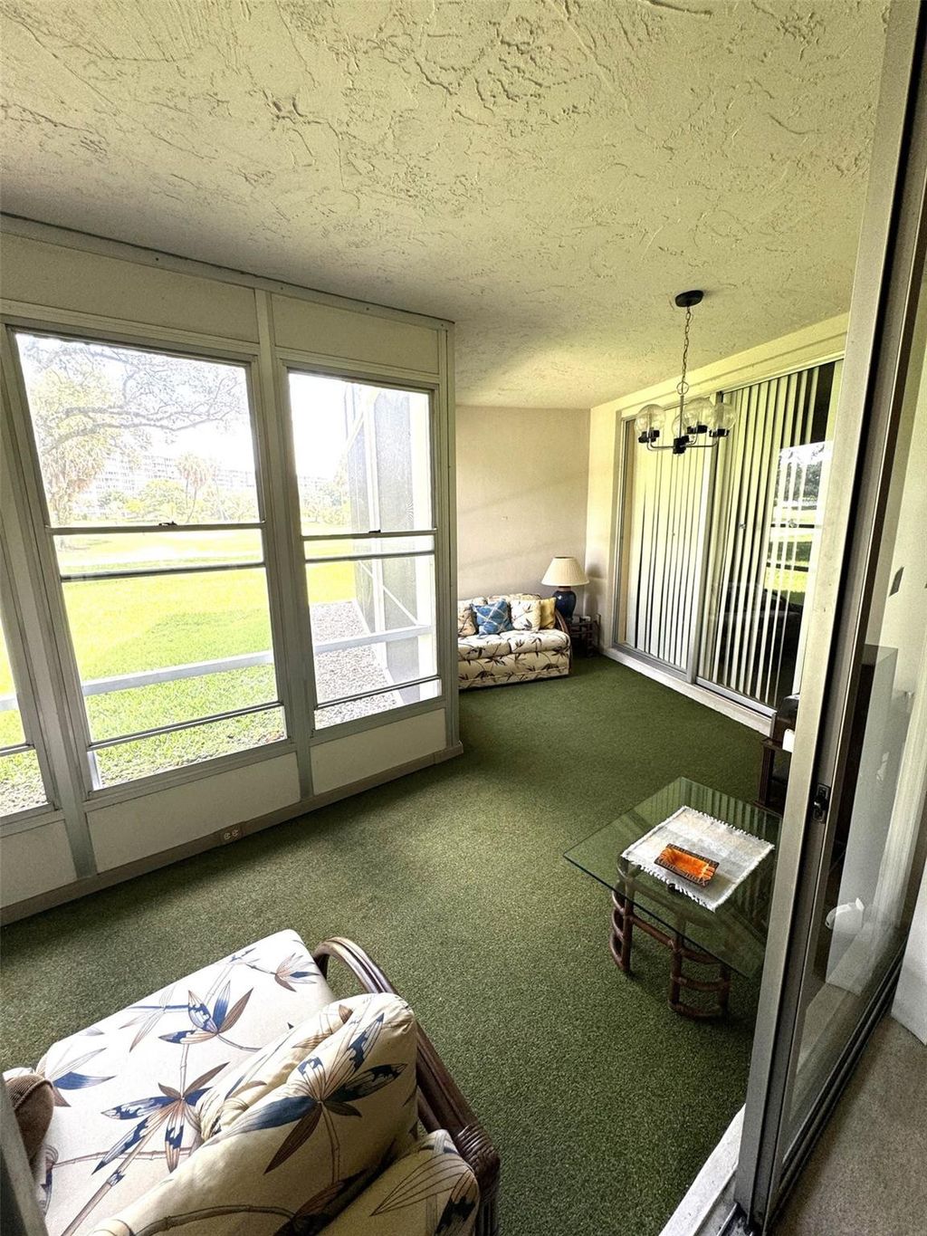 Photo of 3900 Oaks Clubhouse Drive #108, Pompano Beach, FL 33069 (MLS # F10476460)