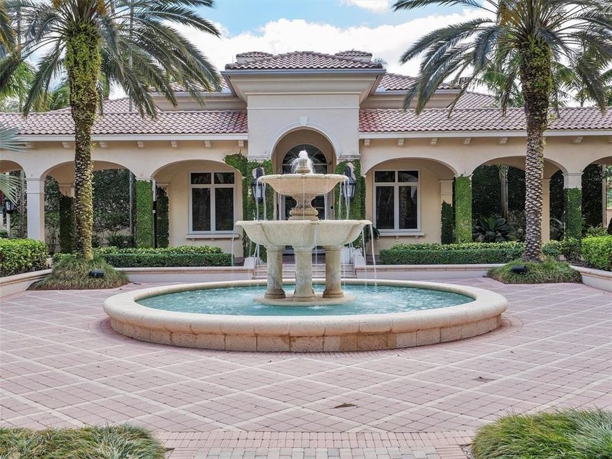 Stunning 4BR/3.5BA waterfront home in prestigious Hawks Landing! Nearly 3,500 sq ft or 4,335 sf on Adjusted bases of luxury with soaring 20' ceilings, a smart split floor plan, and breathtaking long lake views. Bright, open layout with impact windows/doors and beautifully landscaped surroundings. The expansive primary suite features spa-like amenities including a jacuzzi tub, walk-through shower, private lavatory, and bidet. Enjoy modern upgrades like a Tesla charging station, emergency generator, and central sound system with speakers throughout. Community offers a state-of-the-art gym, renovated clubhouse, resort-style pool/spa, championship tennis courts, and pickle ball. Guard-gated for peace of mind. Gigabit internet included. *Estimated rental date subject to change.