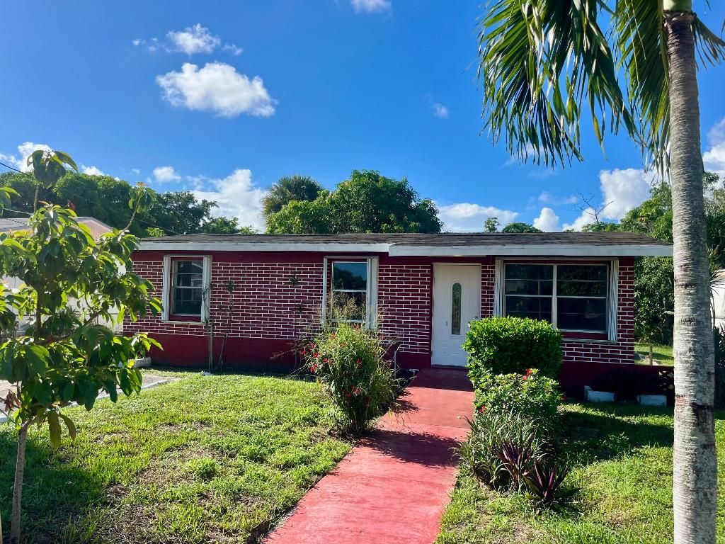 Photo of 725 W 9th Street, Riviera Beach, FL 33404 (MLS # R11128015)