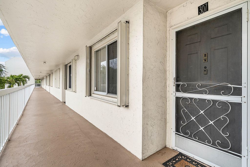 Photo of 3146 Via Poinciana #307, Lake Worth, FL 33467 (MLS # R11167611)