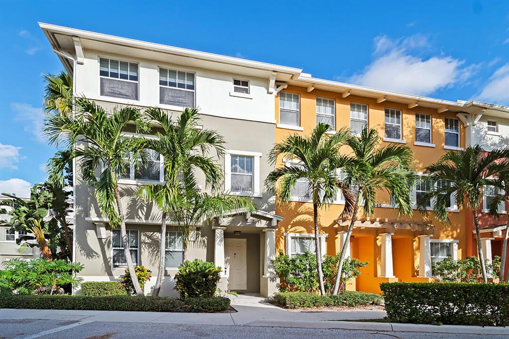 Beautifully updated, spacious end unit in CitySide. This 4 bedroom, 3-1/2 bath, three-story townhouse features a massive floorpan, two car garage, and upgraded kitchen with stainless steel appliances. Situated perfectly just off 95, this gated community is only minutes from the heart of Downtown West Palm, Whole Foods, Palm Beach Outlets, PBI Airport, Rosemary Square, the beach and more! CitySide boasts a resort style pool, newly updated fitness center, running trail and 24 hour security.