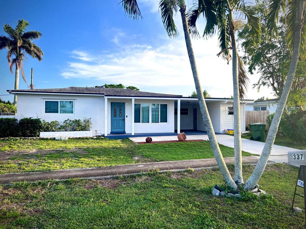 Photo of 337 E Lake Road, Palm Springs, FL 33461 (MLS # R11144065)