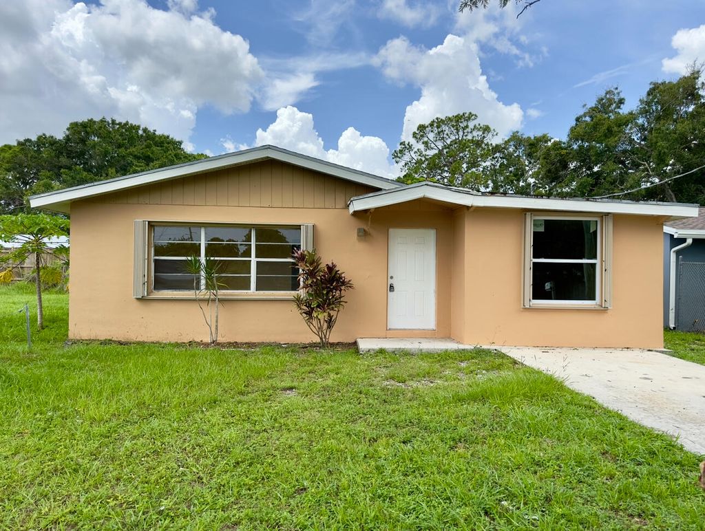 Photo of 3301 Meadow Lane, Fort Pierce, FL 34947 (MLS # R11008414)