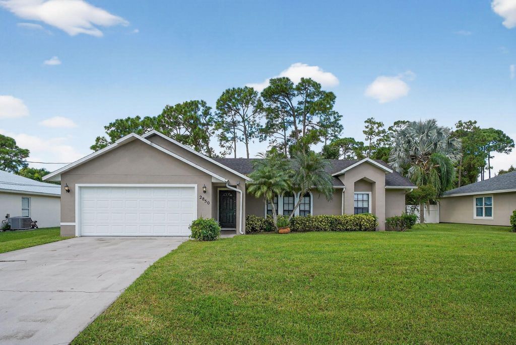 Photo of 2850 SW Vittorio Street, Port Saint Lucie, FL 34953 (MLS # R11127499)