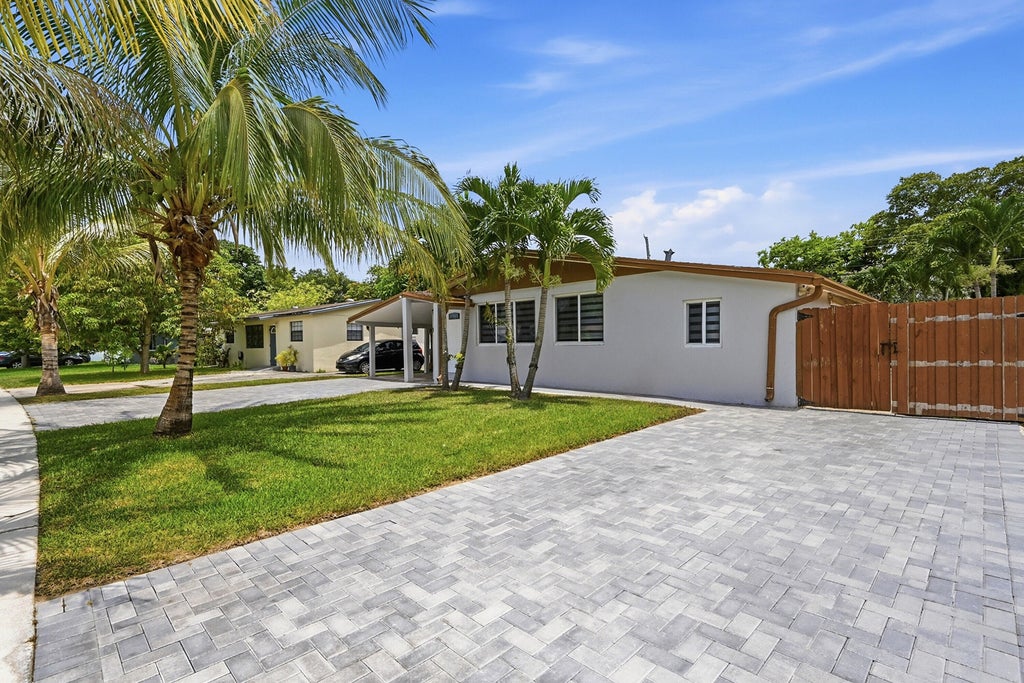 Photo of 4380 NW 59th Court, North Lauderdale, FL 33319 (MLS # B26046786)