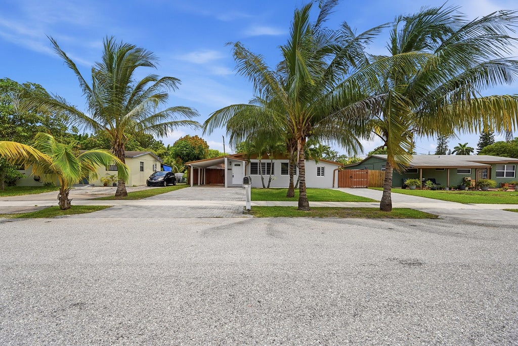 Photo of 4380 NW 59th Court, North Lauderdale, FL 33319 (MLS # B26046786)