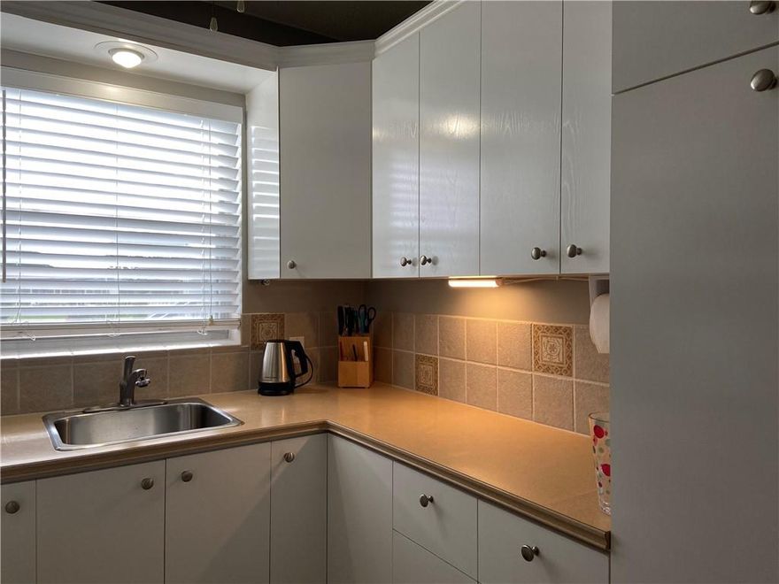 REMARKABLE AND BEST LOCATION IN THE VILLAGE, GORGEOUS SUNSET FROM THE LIVING ROOM, OVER THE CANAL, FROM THIS  2ND FLOOR CORNER 1 BEDROOM 1.5 BATHROOMS, FULLY FURNISHED ! THE MASTER BATHROOM VERY UNIQUE DESIGN IN THE VILLAGE (SEE PHOTOS) BATH FITTER INSTALLED 2017,, LAMINATE FLOORING LIVING ROOM, BEDROOMS, TILED ON HALLWAY AND PATIO BRIGHT AND BREEZE SECOND FLOOR ARE THE MOST DESIRABLE   CENTRAL AIR UNIT..  A/C INSTALLED 2010, AND WATER HEATER ALSO 2010.. LOWEST PRICE IN THE VILLAGE, CORNER 1 BDR. 1.5 BATHROOMS. DON'T MISS THIS ONE , MONTHLY FEES: CEN CLUB $102.00, CVE MASTER $128,00,  FEE for  LYNDHURST F BLDG. $ 170.00  COMMUNITY CLAIMS 55+, OWNER OCCUPIED, PLEASE MAKE APPOINTMENT ON SHOW ASSIST SECOND FLOOR CORNER 1 BEDROOM 1.5 BATHROOMS,VERY NICE UPDATED UNIT, BEST LOCATION IN THE VILLAGE ! STEPS TO CLUBHOUSE and SWIMMING POOL ,,FRONT LIVING ROOM HAS A CANAL VIEW AND SUNSET IS THE BEST TO WATCH FROM THERE.