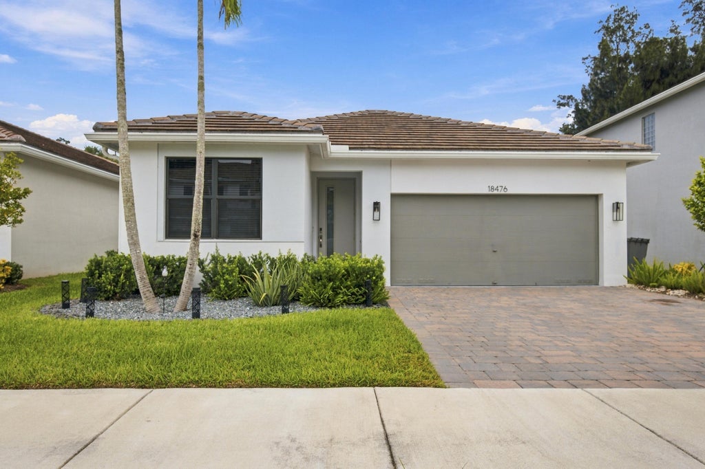 Photo of 18476 Glenstone Street, Jupiter, FL 33458 (MLS # B26078130)