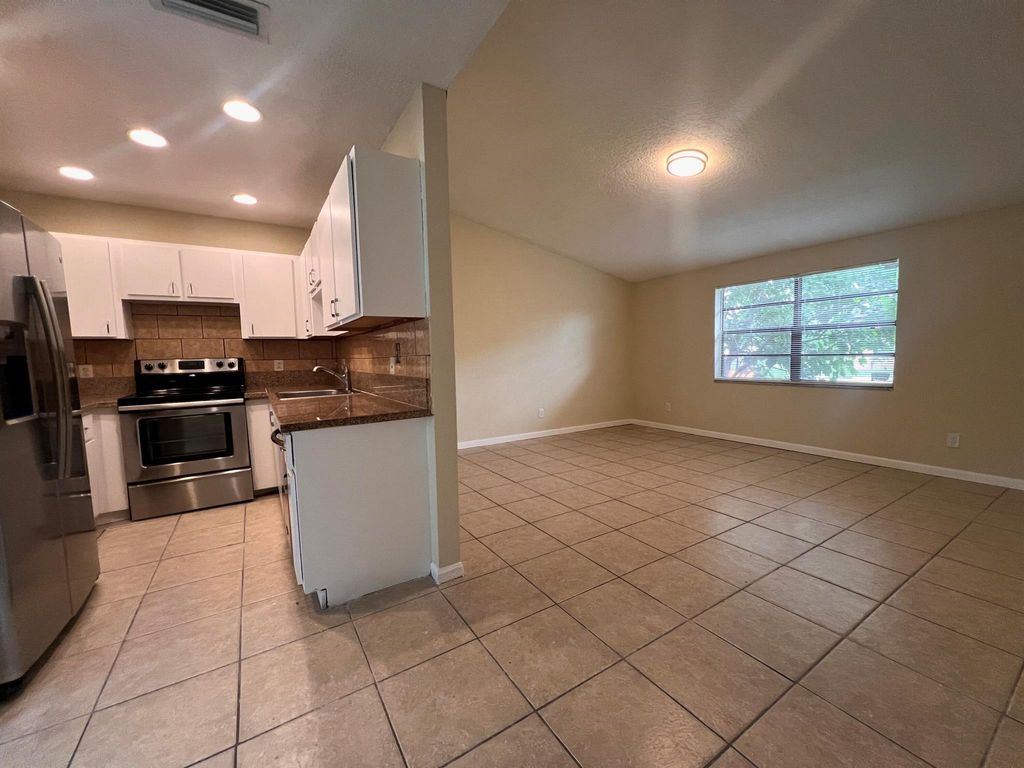 Photo of 423 Glenwood Drive, West Palm Beach, FL 33415 (MLS # R11122543)