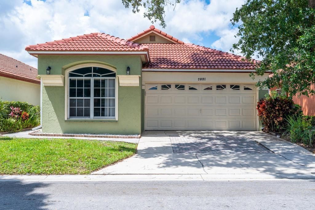 Photo of 2091 Bonisle Circle, Riviera Beach, FL 33418 (MLS # R10880974)