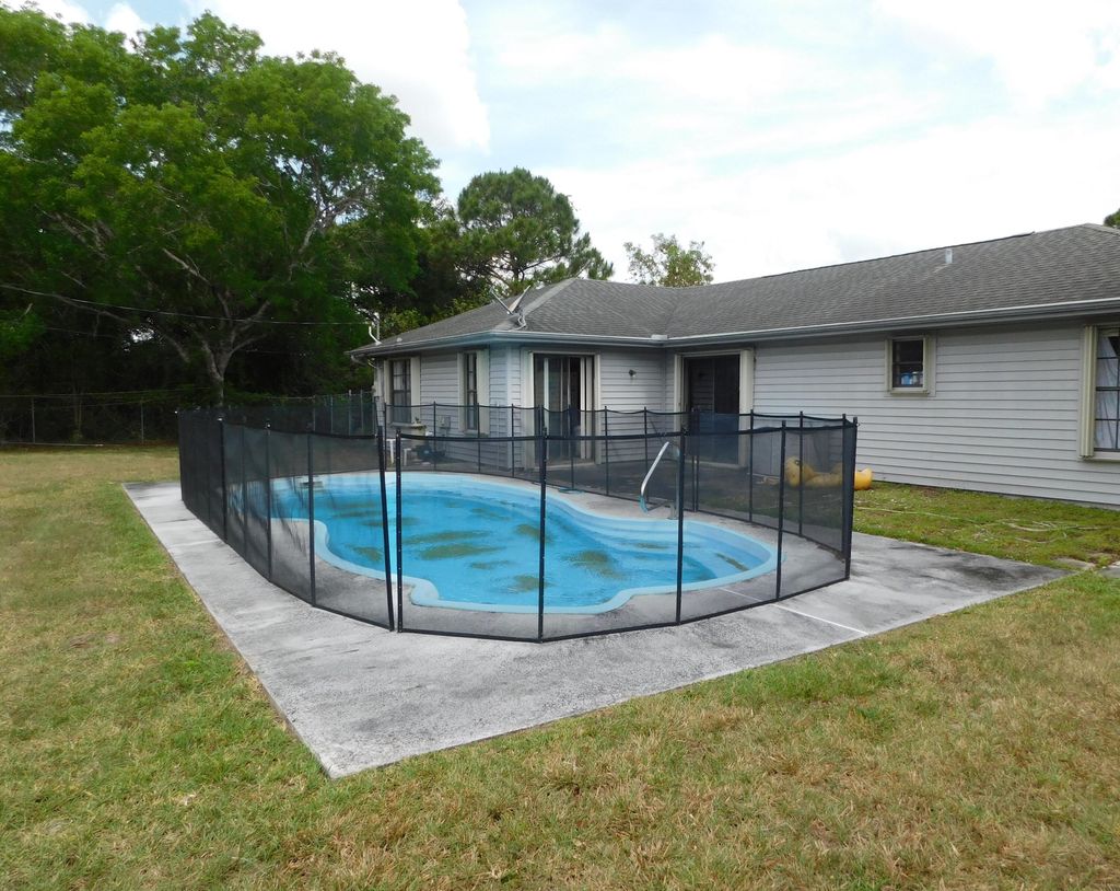 Photo of 522 SW Souris Avenue Ave, Port Saint Lucie, FL 34953 (MLS # R10796050)