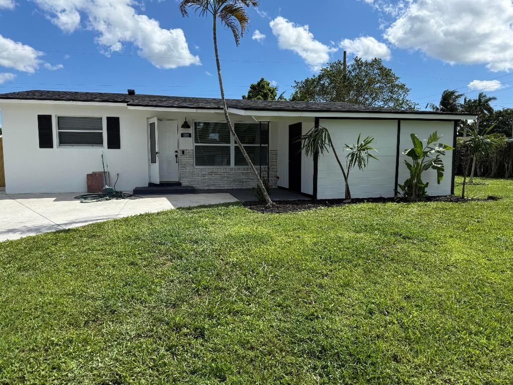 Photo of 958 Montego Drive, West Palm Beach, FL 33415 (MLS # R11134772)