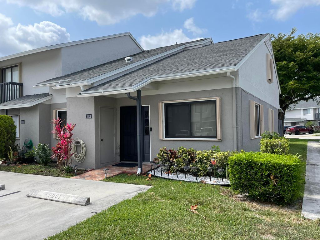 Photo of 2001 Wharf Lane, Greenacres, FL 33463 (MLS # R10988232)