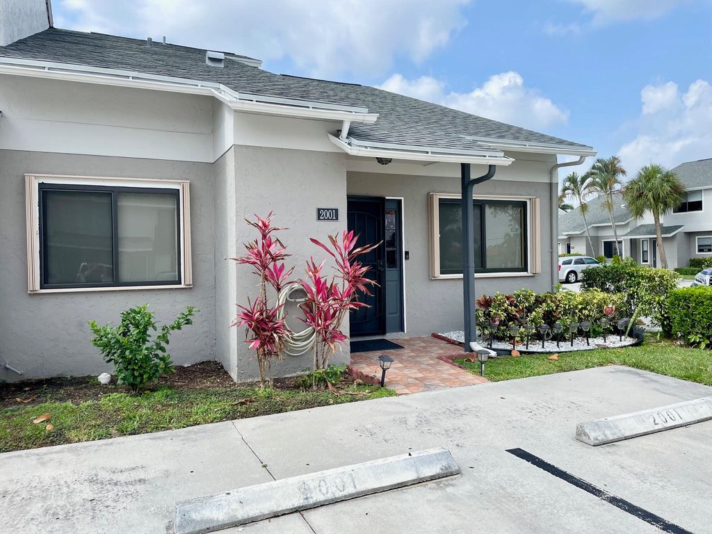 Photo of 2001 Wharf Lane, Greenacres, FL 33463 (MLS # R10988232)