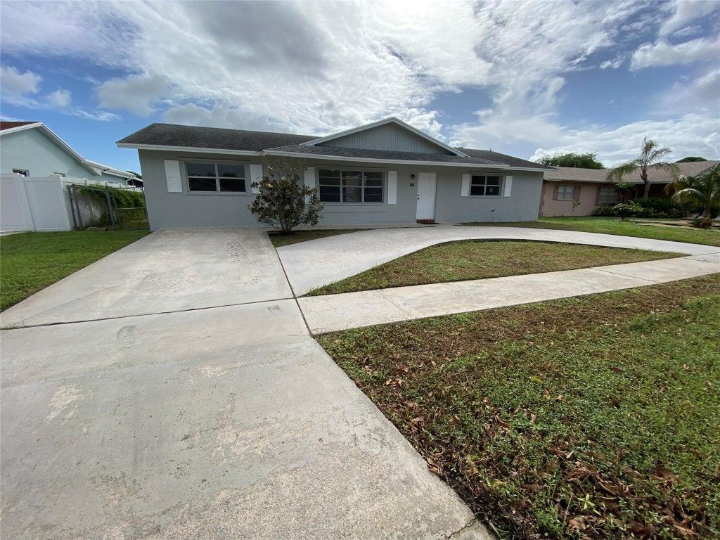 Photo of 225 Wrena Drive, West Palm Beach, FL 33409 (MLS # F10530161)