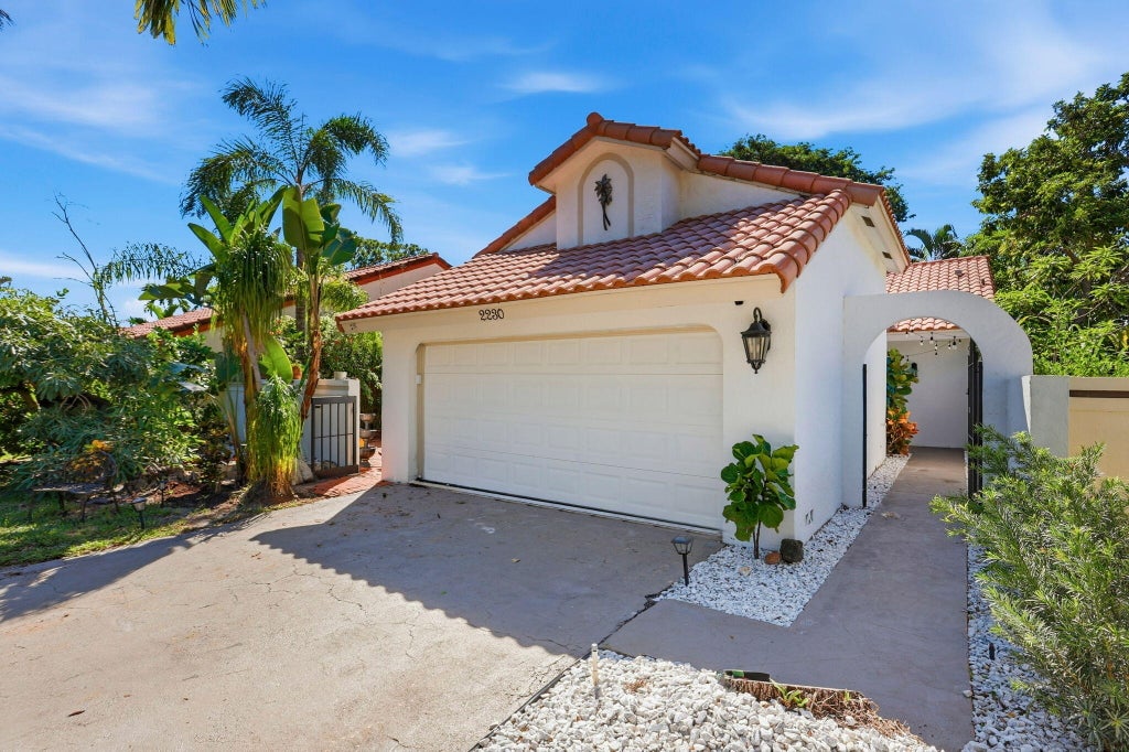 Photo of 2230 NW 14th Street, Delray Beach, FL 33445 (MLS # B26086610)