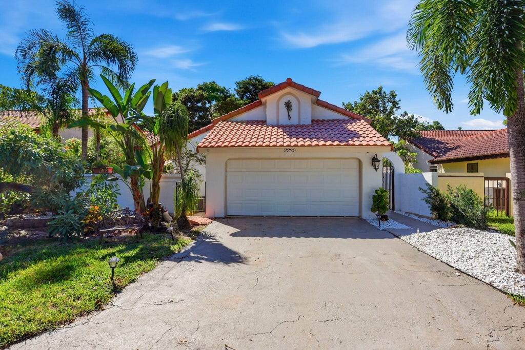 Photo of 2230 NW 14th Street, Delray Beach, FL 33445 (MLS # B26086610)