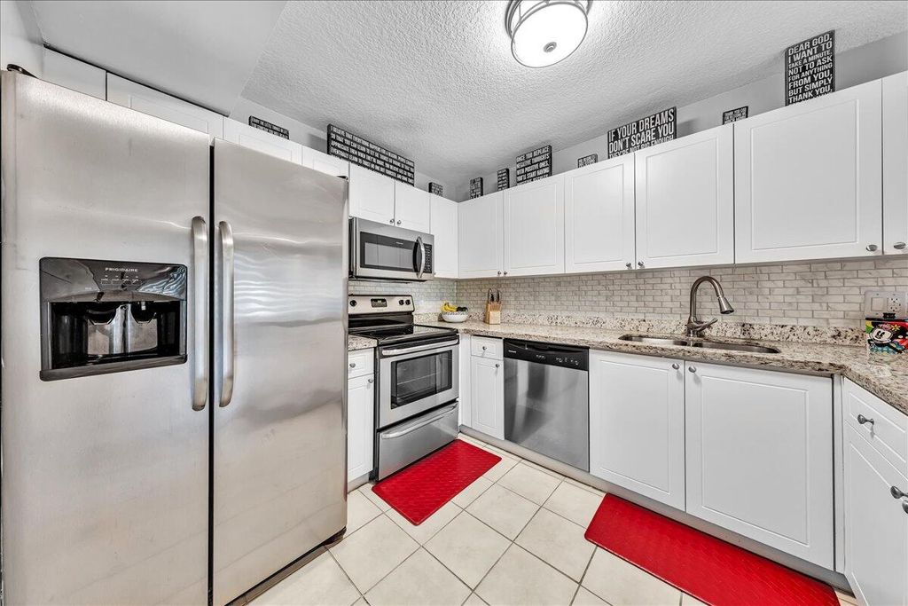 Photo of 8715 Cleary Boulevard, Plantation, FL 33324 (MLS # B26014313)