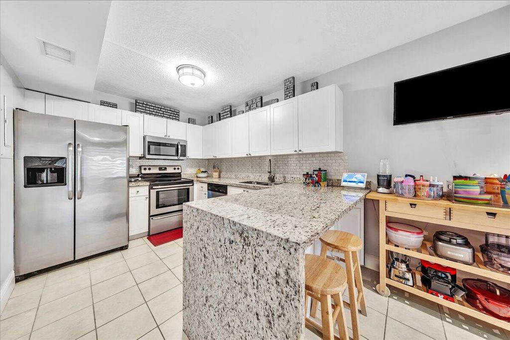 Photo of 8715 Cleary Boulevard, Plantation, FL 33324 (MLS # B26014313)