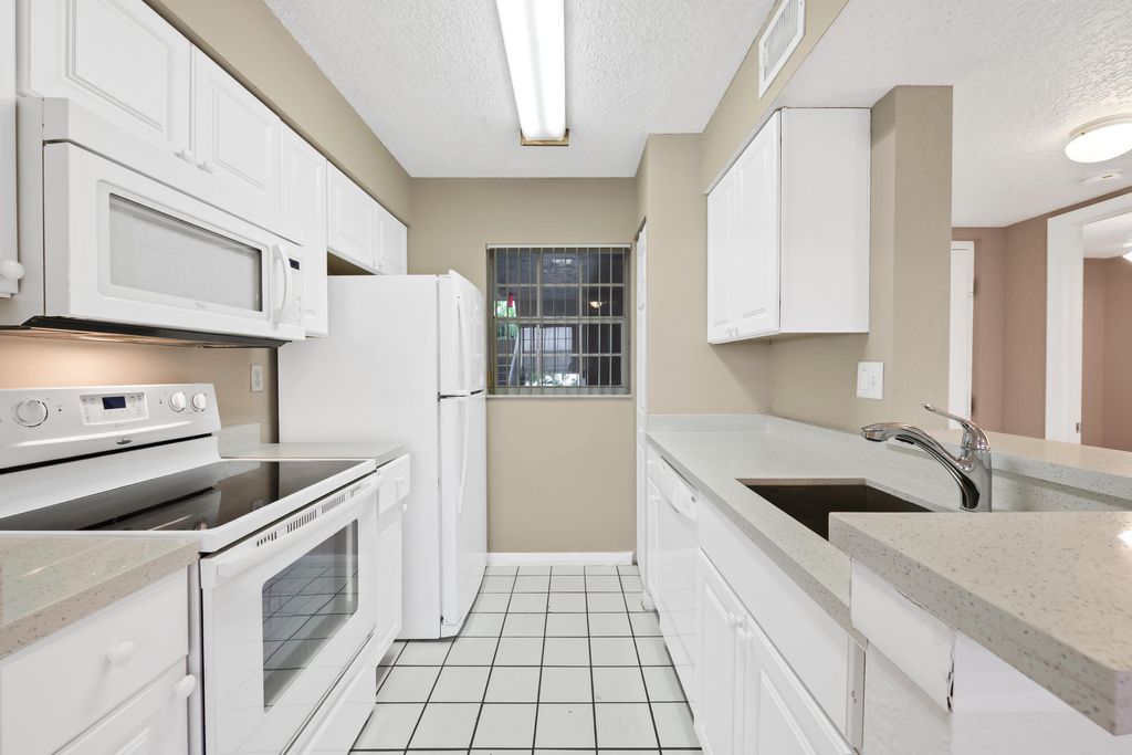 Photo of 2861 N Oakland Forest Drive #202, Oakland Park, FL 33309 (MLS # B26026732)