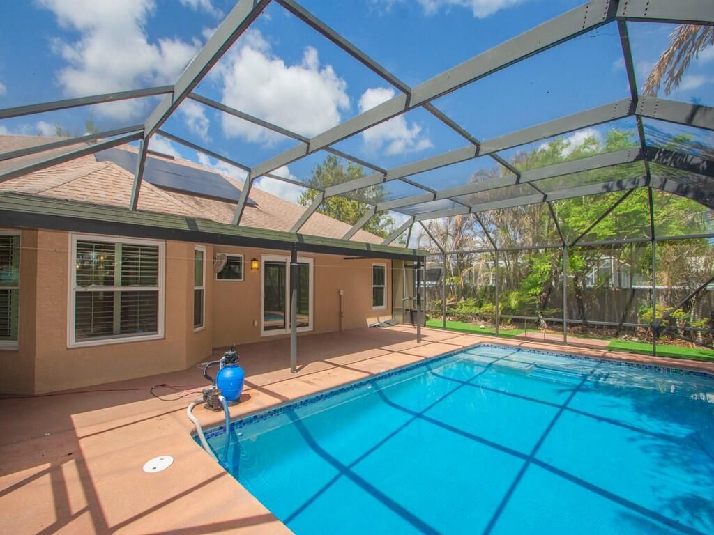 Photo of 2331 SW Freeman Street, Port Saint Lucie, FL 34953 (MLS # B26017970)