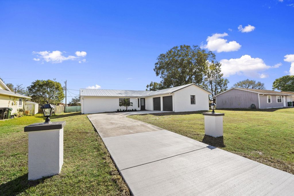 Photo of 1971 SW Morelia Lane, Port Saint Lucie, FL 34953 (MLS # R11168902)