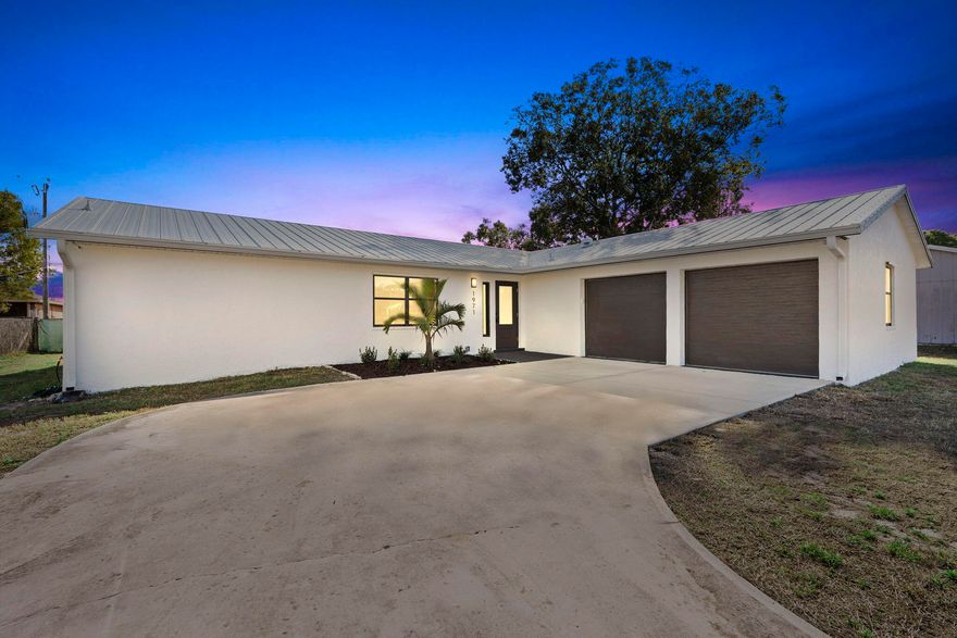 Welcome to this beautifully newly renovated 3-bedroom, 2-bathroom home located in a highly desirable area close to shopping centers, hospitals, dining, and so much more.

From the moment you arrive, you'll notice the brand-new driveway and impressive curb appeal, topped with a new metal roof installed in 2025 for long-lasting durability and peace of mind. Step inside to discover a bright, airy layout filled with abundant natural light and freshly painted interiors that create a clean, move-in-ready feel throughout.

The updated kitchen shines with brand-new appliances, making it perfect for both everyday living and entertaining. Major system upgrades provide added confidence, including a new water heater (2025) to keep you comfortable year-round. The home also features new hurricane-impact garage doors, offering enhanced protection and security.

Enjoy relaxing mornings or peaceful evenings on the screened-in patio, ideal for indoor-outdoor living without the hassle of insects.

Conveniently situated near shopping centers, hospitals, restaurants, and everyday essentials, this home offers the perfect combination of comfort, upgrades, and location. Truly turnkey and ready for its next owner to move in and enjoy!