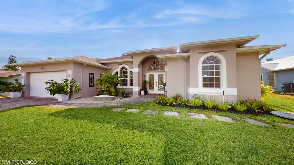 Photo of 631 SE Forgal Street, Port Saint Lucie, FL 34983 (MLS # R10983132)